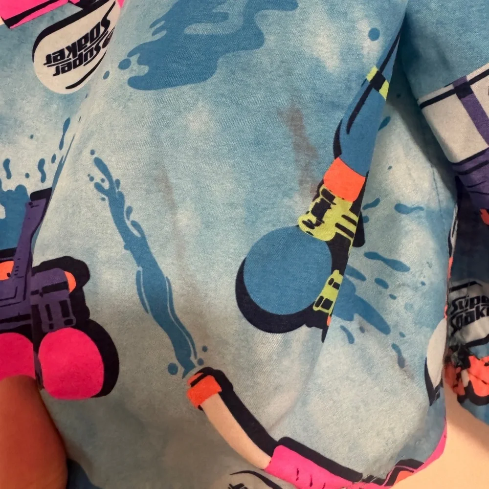 Under Armour Blue Swim Shorts with Neon Water Gun Print